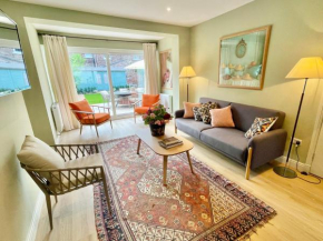 Central townhouse with free-off road parking and garden